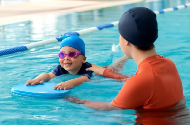 child swimming progress